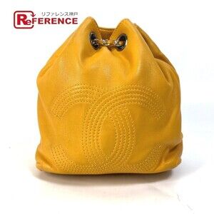 Chanel CC Coco Mark Drawstring Chain Backpack Yellow Lambskin